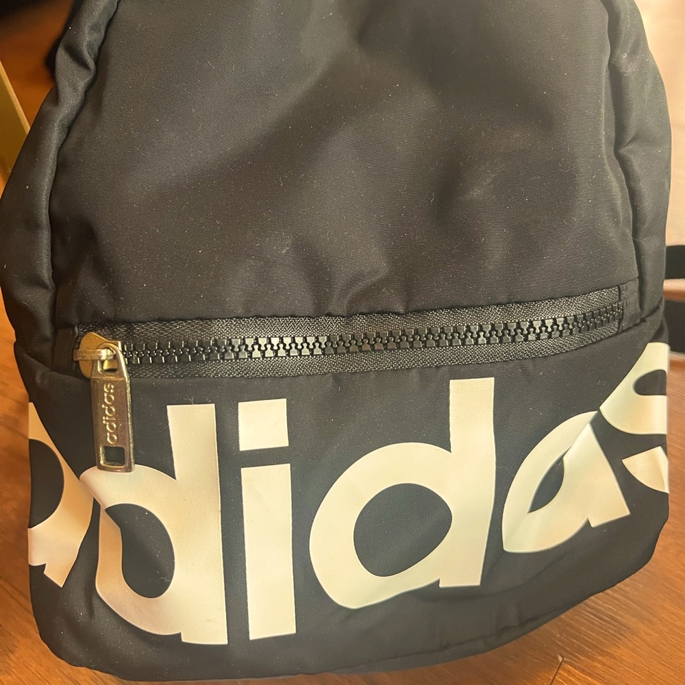 Adidas small backpack. New without tags